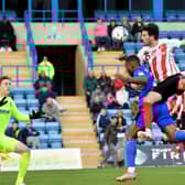 Tom Flanagan nets the winner against Gillingham.