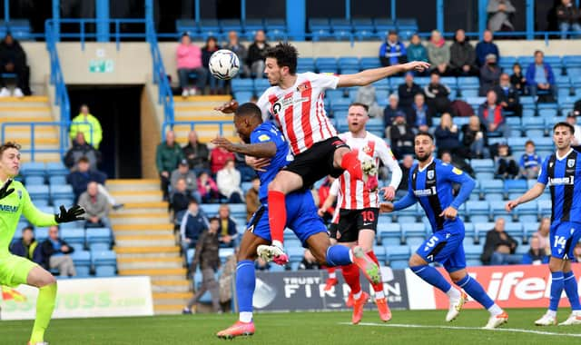 Tom Flanagan nets the winner against Gillingham.