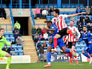 Tom Flanagan nets the winner against Gillingham.