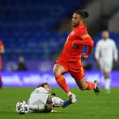 Jeff Hendrick brings down Wales' Tyler Roberts.