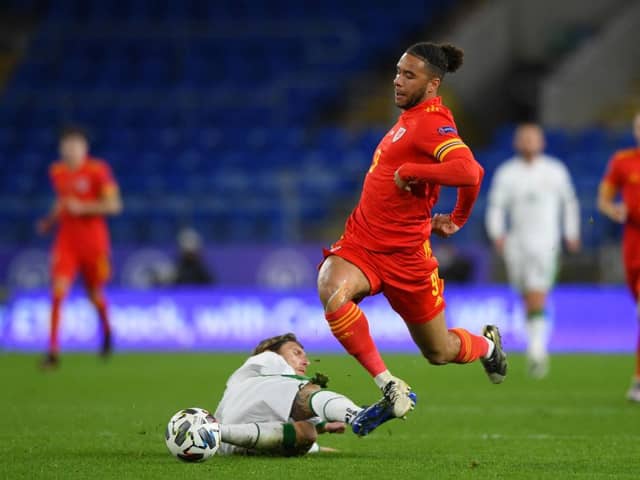 Jeff Hendrick brings down Wales' Tyler Roberts.