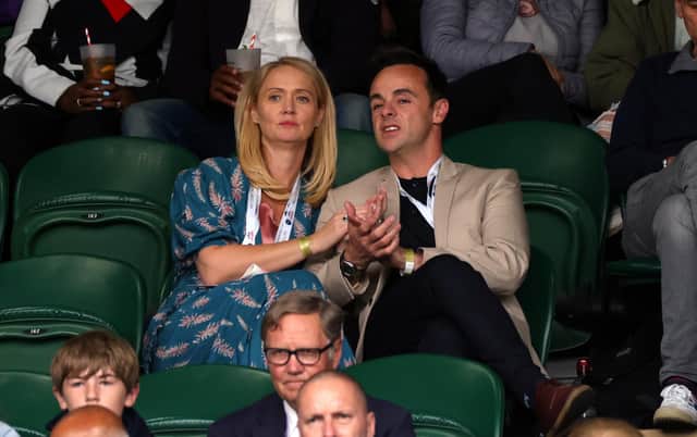 Anne-Marie Corbett and Ant McPartlin (right) watch the Wimbledon Ladies' singles quarter-final match at The All England Lawn Tennis and Croquet Club, Wimbledon.