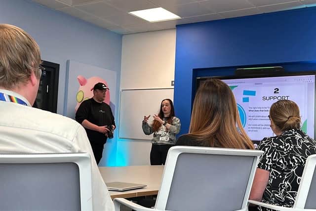 Katie sharing her story with staff from Lumo in Newcastle