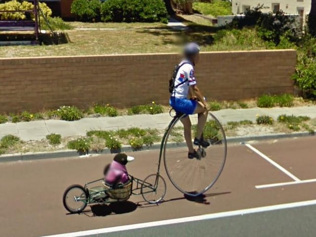 In Western Australia, this person has opted for a rather unusual way to transport themselves, and their stuffed bird toy - via penny farthing.