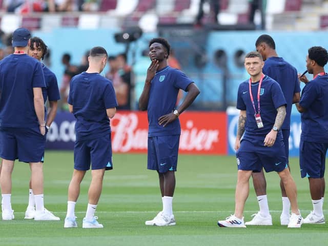 Newcastle United's Kieran Trippier with his England team-mates after of this afternoon's opener against Iran at the Khalifa International Stadium in Doha, Qatar.