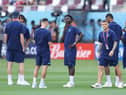 Newcastle United's Kieran Trippier with his England team-mates after of this afternoon's opener against Iran at the Khalifa International Stadium in Doha, Qatar.