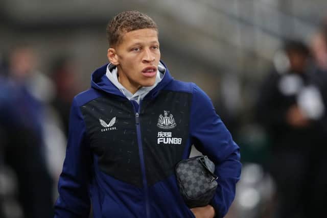 Dwight Gayle of Newcastle United looks on as he arrives at the stadium prior to the Premier League match between Newcastle United and Norwich City at St. James Park on November 30, 2021 in Newcastle upon Tyne, England. (Photo by Ian MacNicol/Getty Images)