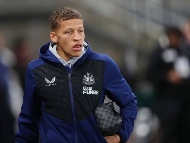 Dwight Gayle of Newcastle United looks on as he arrives at the stadium prior to the Premier League match between Newcastle United and Norwich City at St. James Park on November 30, 2021 in Newcastle upon Tyne, England. (Photo by Ian MacNicol/Getty Images)
