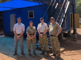Commander Karen Cahill with Danish colleagues at the under-construction fire safety facility.