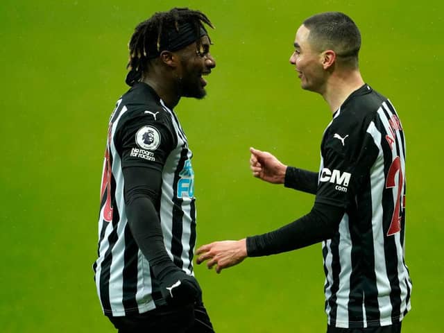 Allan Saint-Maximin congratulates Miguel Almiron on his first goal.