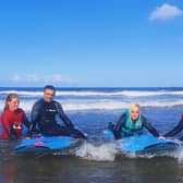 Kelly and Alan want to raise funds for the surf school.