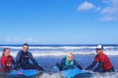 Kelly and Alan want to raise funds for the surf school.