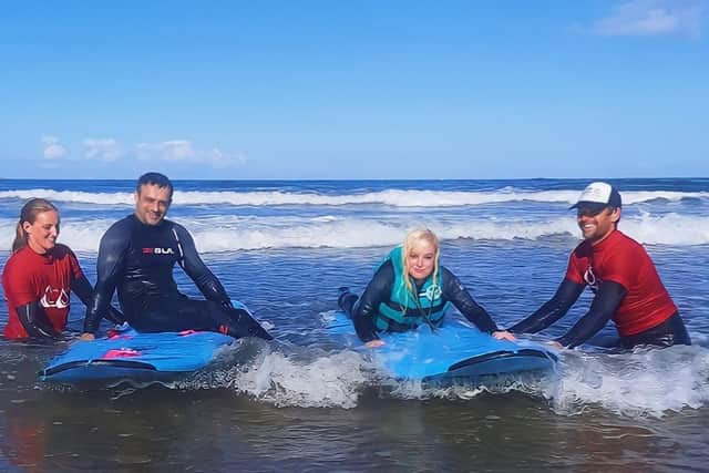 Kelly and Alan want to raise funds for the surf school.
