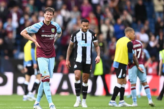 Wout Weghorst of Burnley looks dejected following defeat and relegation to the Sky Bet Championship following the Premier League match between Burnley and Newcastle United at Turf Moor on May 22, 2022 in Burnley, England. (Photo by Gareth Copley/Getty Images)