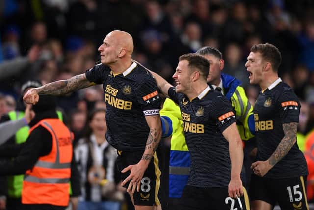 Jonjo Shelvey celebrates with teammate Ryan Fraser of Newcastle after scoring their team's first goal during the Premier League match between Leeds United and Newcastle United at Elland Road on January 22, 2022 in Leeds, England. (Photo by Stu Forster/Getty Images)