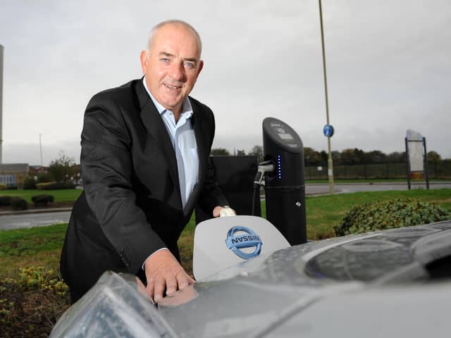 Cllr Ernest Gibson at one of the new charging points on Tyne Street, Jarrow.