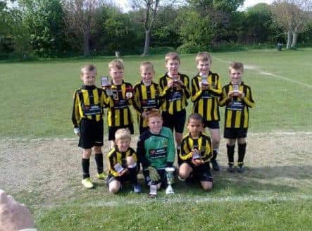 Shola Shoretire pictured with his Hebburn teammates.