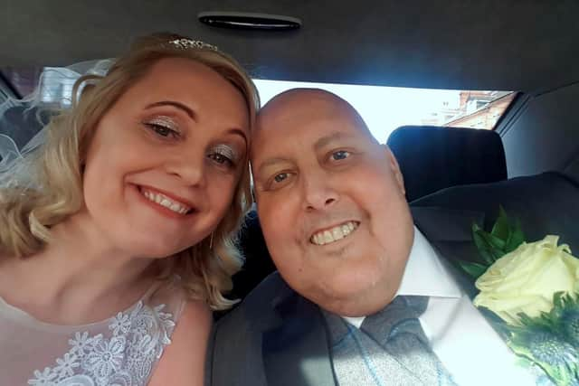 Terminal cancer patient Chris Clark, 43, who hosted his own wake last month to say goodbye to friends and family, and has now fulfilled his dying wish by marrying his "rock", partner Claire, 46, in a registry office ceremony in South Shields.