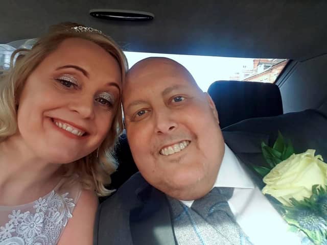 Terminal cancer patient Chris Clark, 43, who hosted his own wake last month to say goodbye to friends and family, and has now fulfilled his dying wish by marrying his "rock", partner Claire, 46, in a registry office ceremony in South Shields.