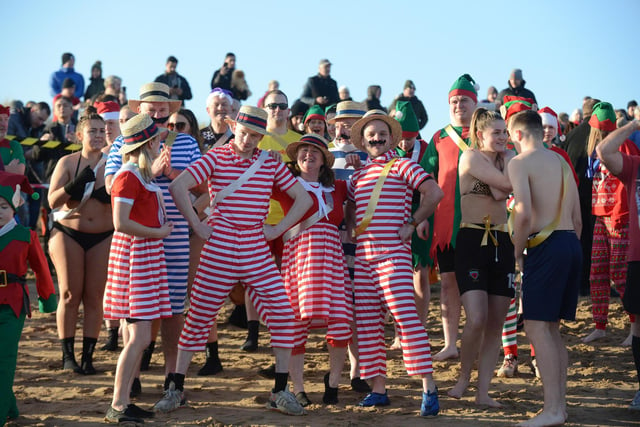 Participants in fancy dress ready for the Boxing Day dip at Littlehaven Beach.