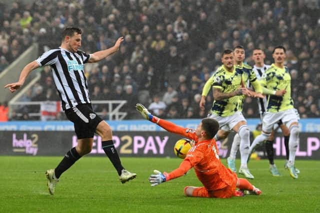 Chris Wood of Newcastle United has a shot saved by Illan Meslier of Leeds United during the Premier League match between Newcastle United and Leeds United at St. James Park on December 31, 2022 in Newcastle upon Tyne, England. (Photo by Stu Forster/Getty Images)