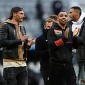 Fabian Schar, Callum Wilson and Jamal Lewis of Newcastle United applaud the fans after the Premier League match between Newcastle United and Sheffield United at St. James Park on May 19, 2021 in Newcastle upon Tyne, England.