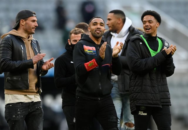 Fabian Schar, Callum Wilson and Jamal Lewis of Newcastle United applaud the fans after the Premier League match between Newcastle United and Sheffield United at St. James Park on May 19, 2021 in Newcastle upon Tyne, England.