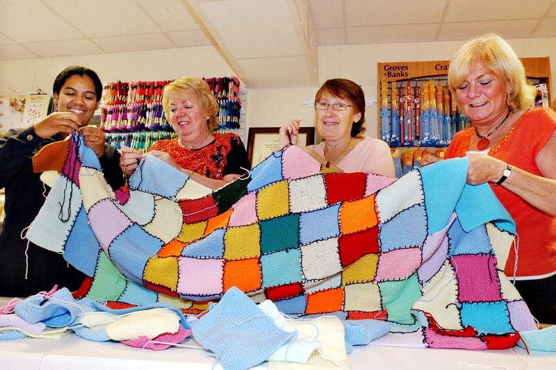 A 2005 flashback. It shows Jozene McKinnon, Jean Smith, Grace Stanton and Carol Riddell working on sewing a blanket together at the Village Craft Shop in Boldon Colliery.