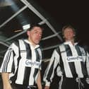 MONACO, FRANCE - MARCH 18:  Newcastle United players Peter Beardsley (c) Warren Barton and David Batty (l) emerge from the players tunnel wearing the Center Parcs logo on their shirts before the second leg of the UEFA Cup match against Monaco in France on March 18, 1997.  (Photo by Mark Thompson/Allsport/Getty Images)