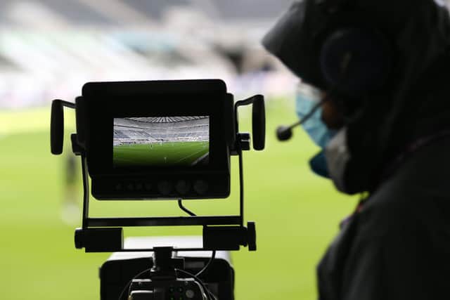 The pitch is seen through the lens of a TV camera ahead of the English Premier League football match between Newcastle United and Everton at St James' Park