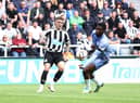 Kieran Trippier of Newcastle United crosses the ball which is adjudged to have hit the hand of Jefferson Lerma of AFC Bournemouth after a VAR check leading to a penalty being awarded during the Premier League match between Newcastle United and AFC Bournemouth at St. James Park on September 17, 2022 in Newcastle upon Tyne, England. (Photo by George Wood/Getty Images)