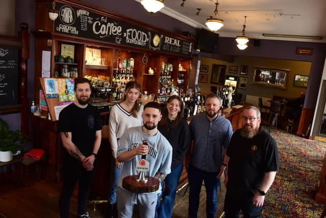 Staff at The Marine pub celebrate winning Sunderland & South Tyneside's CAMRA branch Pub of the Year.