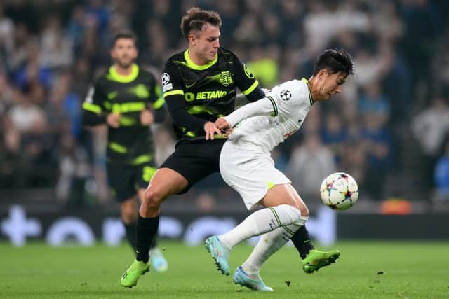 Son Heung-Min of Tottenham Hotspur is challenged by Manuel Ugarte of Sporting CP during the UEFA Champions League group D match between Tottenham Hotspur and Sporting CP at Tottenham Hotspur Stadium on October 26, 2022 in London, England. (Photo by Shaun Botterill/Getty Images)