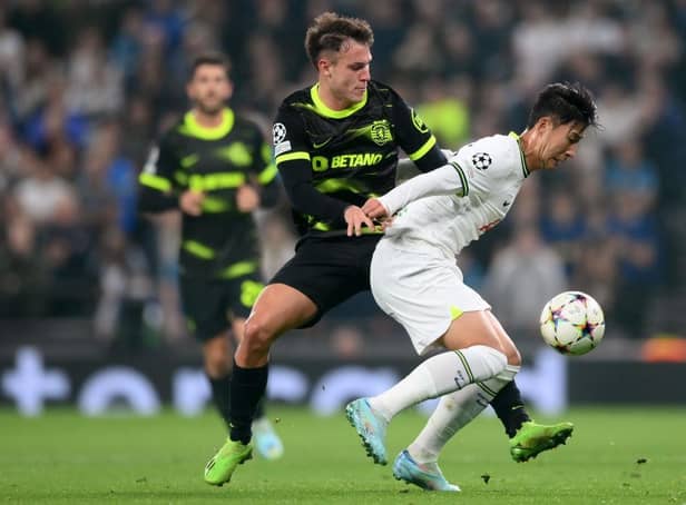 Son Heung-Min of Tottenham Hotspur is challenged by Manuel Ugarte of Sporting CP during the UEFA Champions League group D match between Tottenham Hotspur and Sporting CP at Tottenham Hotspur Stadium on October 26, 2022 in London, England. (Photo by Shaun Botterill/Getty Images)