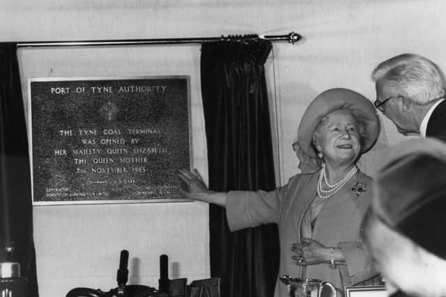 Queen Elizabeth II unveiling the plaque at the Port of Tyne, with Gordon Carr, chairman of the Port.