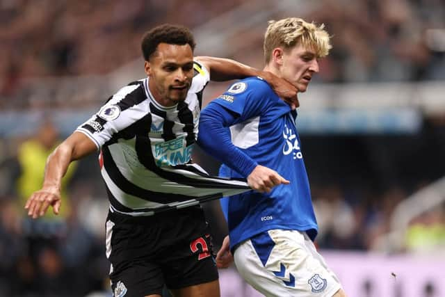 Anthony Gordon of Everton challenges Jacob Murphy of Newcastle United during the Premier League match between Newcastle United and Everton FC at St. James Park on October 19, 2022 in Newcastle upon Tyne, England. (Photo by George Wood/Getty Images)