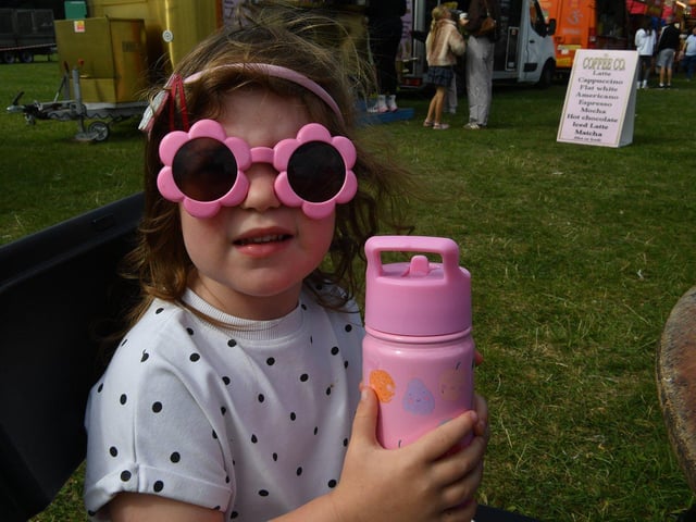 Olivia Stott wears her favourite sunglasses for the occasion.