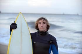 Surfer Adam Ball has cystic fibrosis and belives surfing has had a positive impact on his condition.