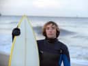 Surfer Adam Ball has cystic fibrosis and belives surfing has had a positive impact on his condition.
