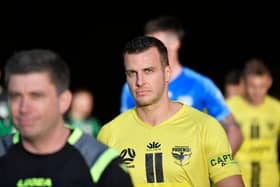 Steven Taylor playing for Wellington Phoenix.