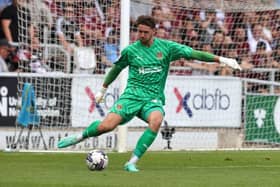 Max Thompson in action for Northampton Town.