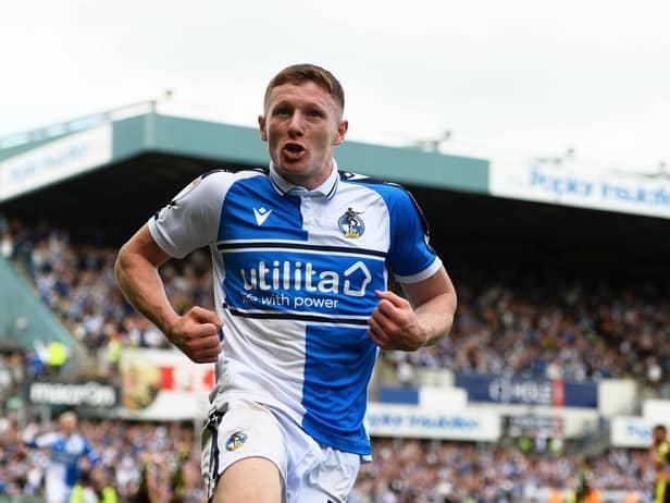 Elliot Anderson celebrates his side's seventh goal during against Scunthorpe United.