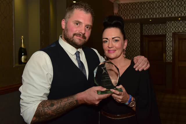 Chris and Sarah Cookson with their trophy.