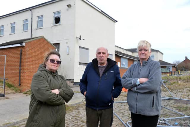 Hampshire Way residents, from left, Jeanette Dearden, Norman Riella and Christine Scott are angry at the lack of help with youths throwing roof tiles from a former care home into the residents gardens.