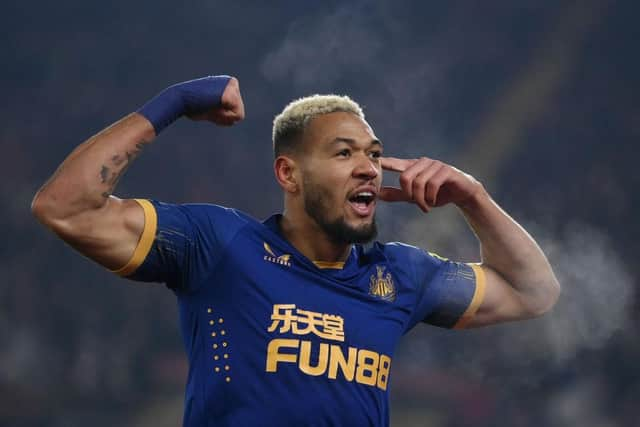 Joelinton celebrates Newcastle United's goal.