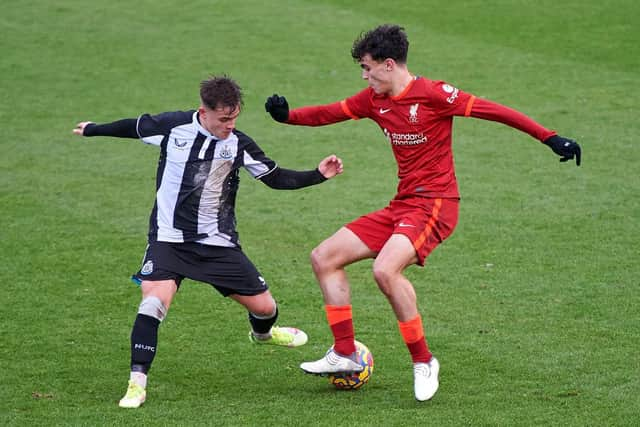 Newcastle United defender Beau Beresford challenges Liverpool's Stefan Bajcetic in December.