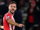 Southampton's English striker Adam Armstrong celebrates his goal during the English Premier League football match between Southampton and Aston Villa at St Mary's Stadium in Southampton, southern England on November 5, 2021. (Photo by GLYN KIRK/AFP via Getty Images)