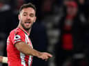 Southampton's English striker Adam Armstrong celebrates his goal during the English Premier League football match between Southampton and Aston Villa at St Mary's Stadium in Southampton, southern England on November 5, 2021. (Photo by GLYN KIRK/AFP via Getty Images)