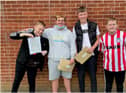 Matthew Rutherford, Billy Moy, Logan Ebanks and Niall Rutherford celebrate their GCSE results at St Wilfrid's R C College.
