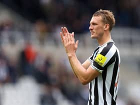 Dan Burn of Newcastle United applauds the fans following the Premier League match between Newcastle United and AFC Bournemouth at St. James Park on September 17, 2022 in Newcastle upon Tyne, England. (Photo by George Wood/Getty Images)